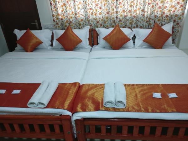 A V Residency : photo 6 de la chambre suite familiale avec douche