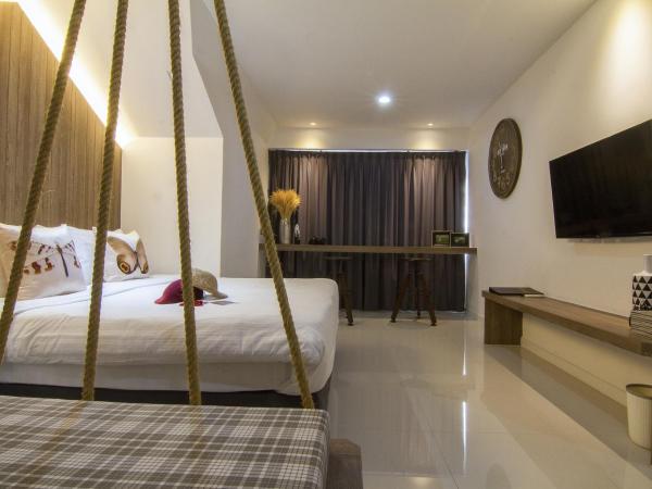 Bossotel Chiang Mai : photo 7 de la chambre chambre lit queen-size - vue sur jardin
