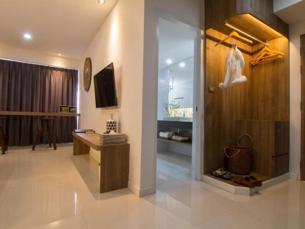 Bossotel Chiang Mai : photo 8 de la chambre chambre lit queen-size - vue sur jardin