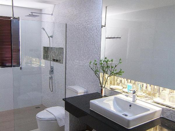 Bossotel Chiang Mai : photo 9 de la chambre chambre lit queen-size - vue sur jardin