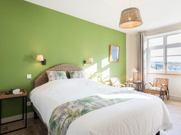 Sur le quai : photo 6 de la chambre chambre lit king-size - vue sur jardin