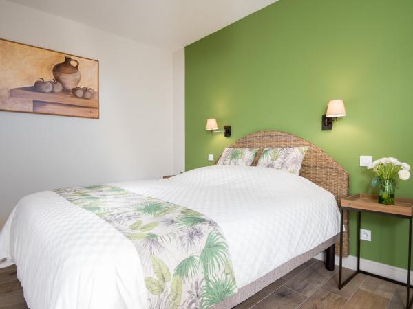 Sur le quai : photo 7 de la chambre chambre lit king-size - vue sur jardin