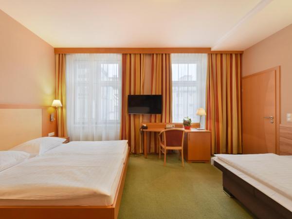 Hotel Lucia : photo 7 de la chambre chambre triple