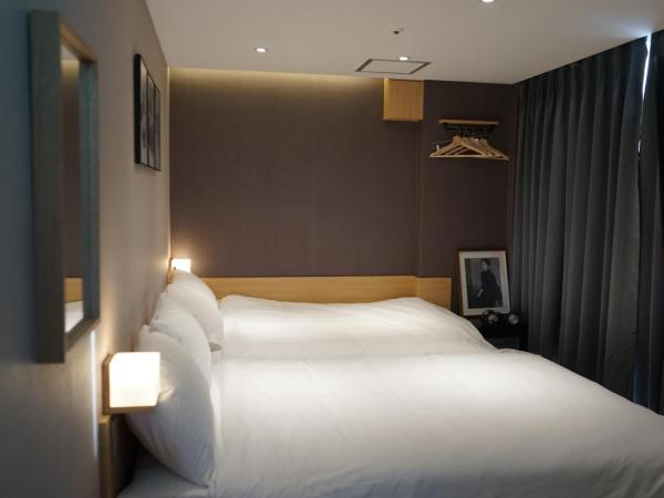 Artravel Myeongdong : photo 3 de la chambre chambre quadruple avec salle de bains privative