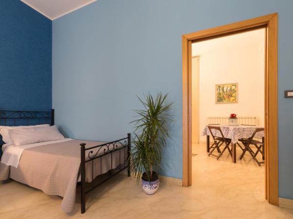 Catania Inn Rooms : photo 8 de la chambre chambre quadruple avec balcon 