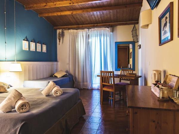 Corte San Mattia : photo 9 de la chambre chambre triple standard avec jardin privé