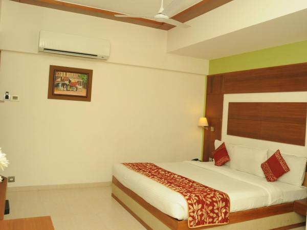 Ponnis Grand Inn : photo 4 de la chambre chambre deluxe