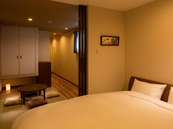 Yukari Kyoto : photo 1 de la chambre chambre lit queen-size avec coin tatami et balcon