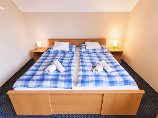 Pension Lukas : photo 1 de la chambre chambre double avec baignoire #7