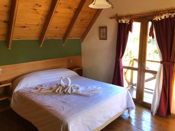 Complejo Duendes del Maiten : photo 3 de la chambre cottage - vue sur jardin