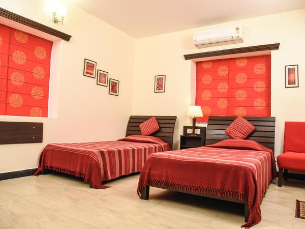 Red Arrow Residency : photo 5 de la chambre chambre deluxe double ou lits jumeaux
