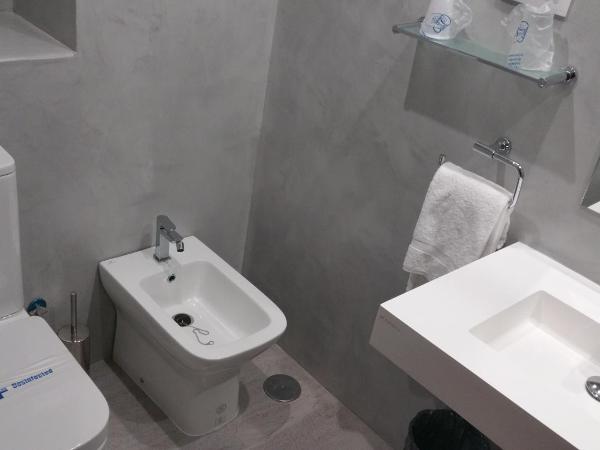 Hostal Tilos : photo 1 de la chambre chambre triple