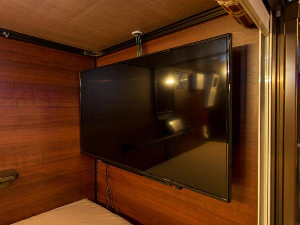 Capsule Hotel Anshin Oyado Premium Resort Kyoto Shijo Karasuma : photo 6 de la chambre chambre capsule supérieure pour homme