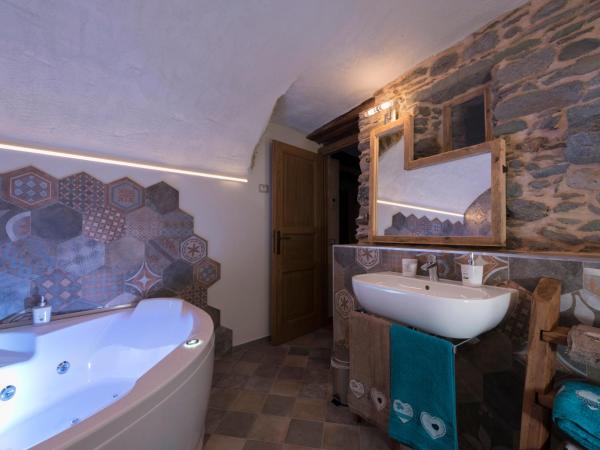 Chambres d'hôtes La Moraine Enchantée : photo 4 de la chambre chambre supérieure jacuzi