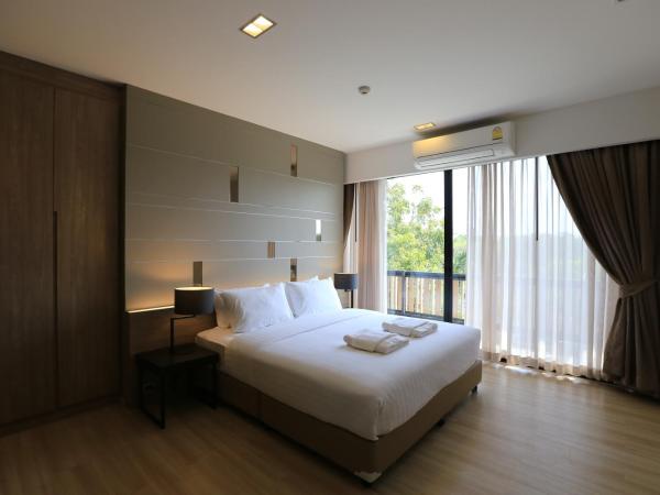 Hyde Park Chiangmai : photo 1 de la chambre grande suite - parc