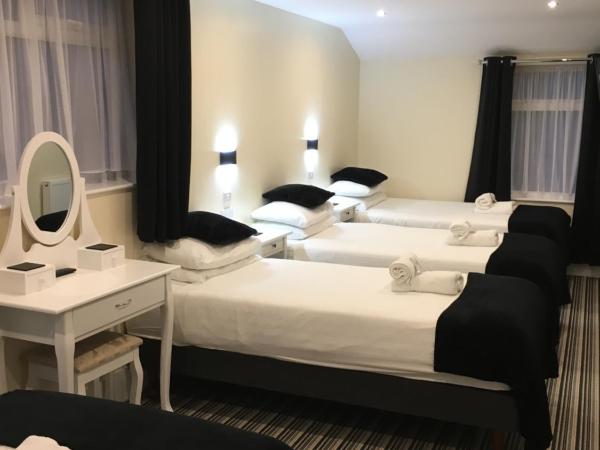 Happy Return Hotel : photo 3 de la chambre chambre quadruple