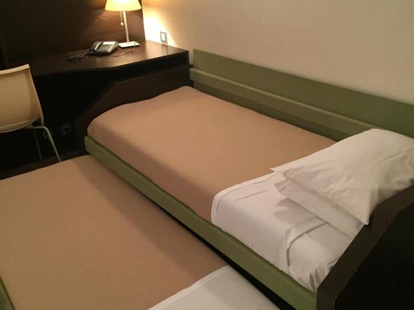 At Home Appart Hotel : photo 1 de la chambre studio lits jumeaux