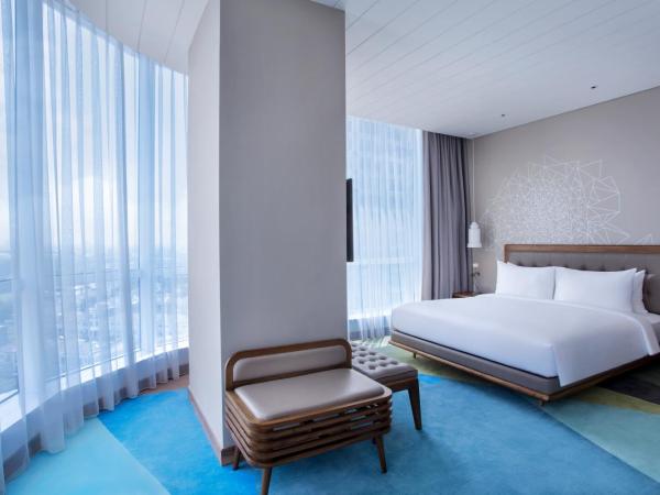 Mercure Jakarta Pantai Indah Kapuk : photo 2 de la chambre suite lit king-size