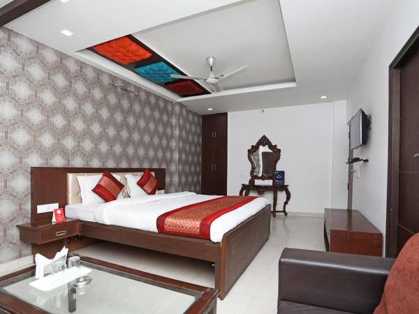 Hotel Flora Inn : photo 3 de la chambre chambre double deluxe (2 adultes + 1 enfant)