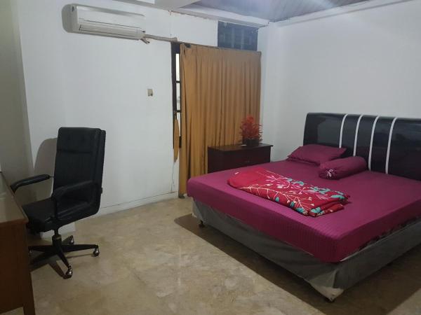 Mayestik Guest House Syariah : photo 8 de la chambre suite deluxe avec lit king-size