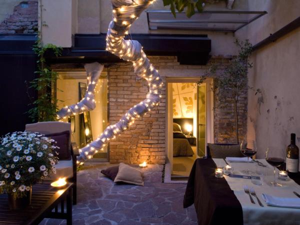 Avogaria 5 Rooms : photo 3 de la chambre suite junior avec jardin privé