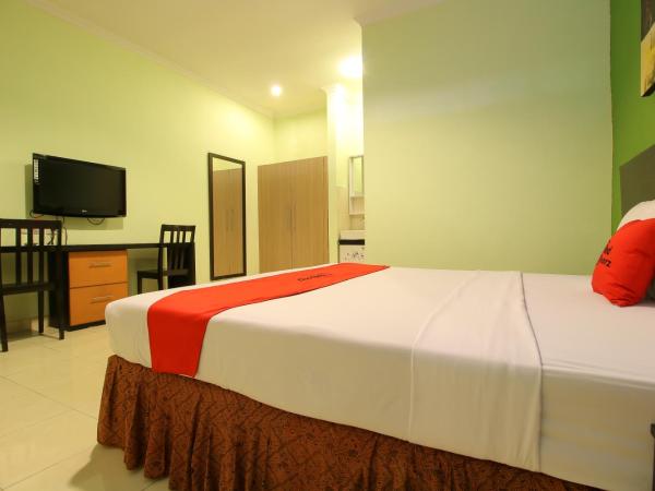 RedDoorz Plus @ Taman Siswa 2 : photo 5 de la chambre chambre double