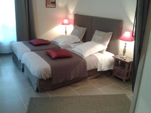 Sarlat Côté Jardin : photo 1 de la chambre chambre double ou lits jumeaux - rez-de-chaussée