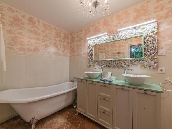 Rey Don Pedro Luxury Home : photo 6 de la chambre chambre lit queen-size - vue sur jardin