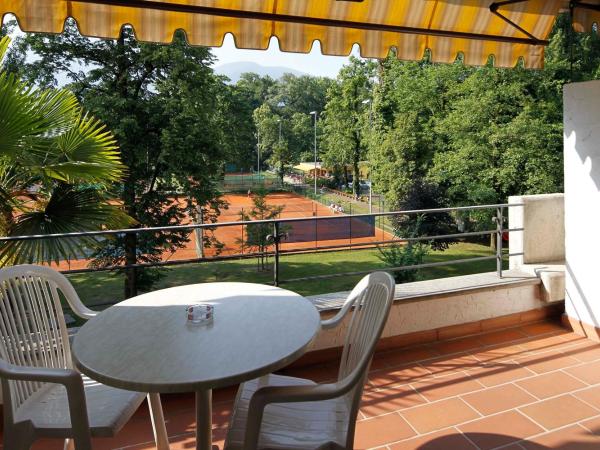 Aparthotel Al Lago : photo 1 de la chambre chambre double/lits jumeaux standard avec balcon