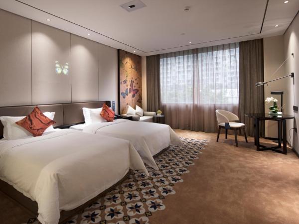 Paco Hotel Dongpu Guanghzou -Free Shuttle Bus for Canton Fair : photo 1 de la chambre chambre lits jumeaux exécutive