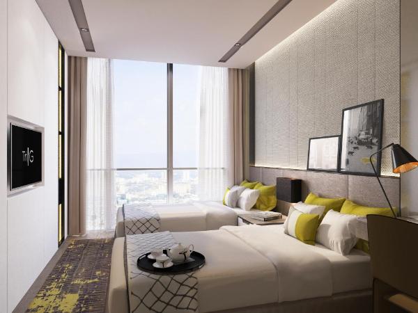 Centro Westside by Rotana : photo 5 de la chambre chambre lits jumeaux - vue sur ville