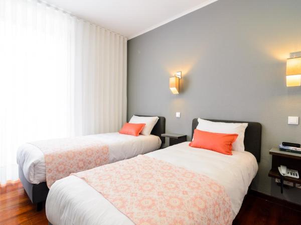 Hotel Portuense Lisboa : photo 8 de la chambre chambre triple