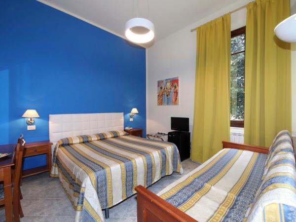 Hotel Moderno : photo 2 de la chambre chambre quadruple