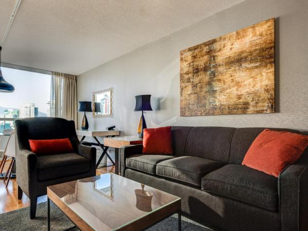 Carmana Hotel & Suites : photo 1 de la chambre suite 2 chambres exécutive avec 1 lit king-size et 1 lit queen-size