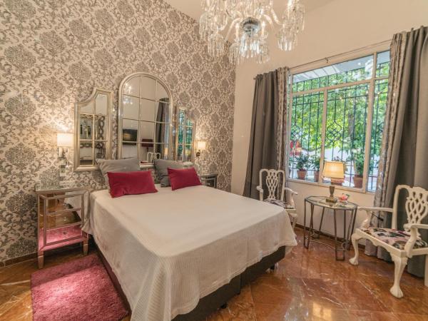 Rey Don Pedro Luxury Home : photo 4 de la chambre chambre lit queen-size - vue sur jardin