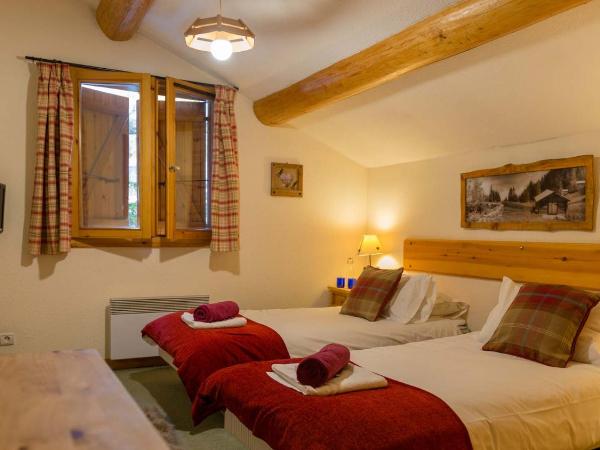 Chalet Coeur des Brévières by Chalet Chardons : photo 1 de la chambre chambre double ou lits jumeaux Économique