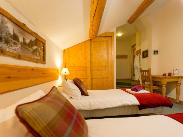 Chalet Coeur des Brévières by Chalet Chardons : photo 5 de la chambre chambre double ou lits jumeaux Économique