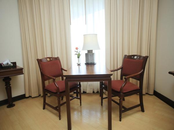 Wiang Inn Hotel : photo 3 de la chambre chambre deluxe double ou lits jumeaux