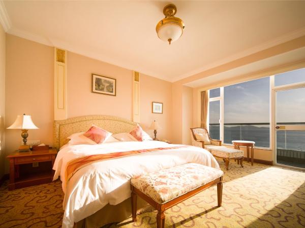 Huiquan Dynasty Hotel Qingdao : photo 1 de la chambre chambre lits jumeaux exécutive avec vue sur la mer