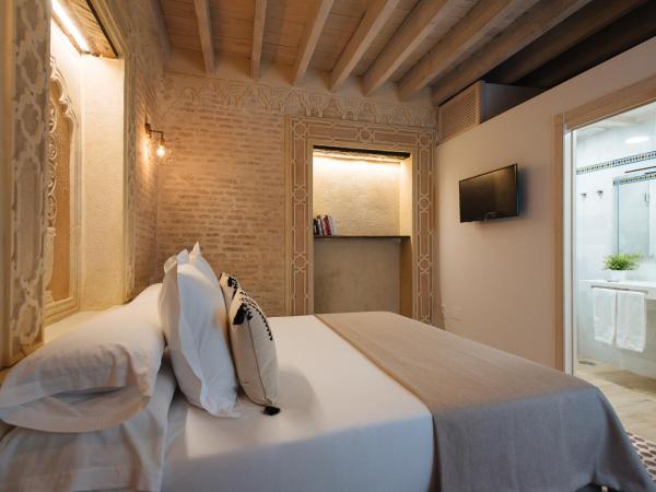 Hommyhome Casa Assle : photo 5 de la chambre suite supérieure lit king-size