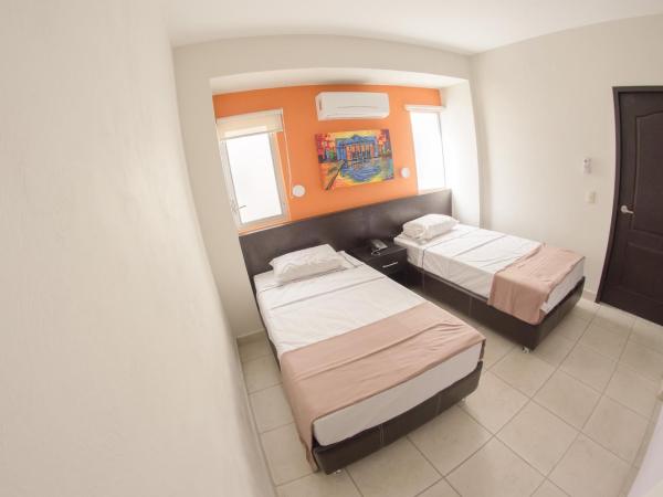 Hotel Belisario INN : photo 7 de la chambre chambre lits jumeaux standard