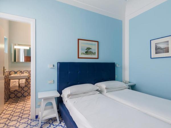 Hotel Mignon Meublè : photo 4 de la chambre chambre triple Économique