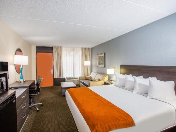 Days Inn & Suites by Wyndham Orlando Airport : photo 3 de la chambre suite 1 chambre lit king-size - non-fumeurs