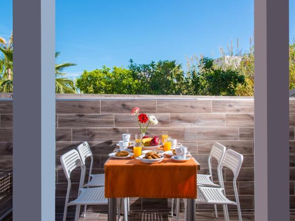 Dorian Boutique Hotel-Apartments : photo 4 de la chambre suite familiale décloisonnée au rez-de-chaussée