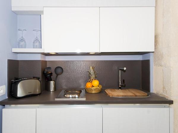 Palazzo Alfeo Aparthotel : photo 8 de la chambre appartement avec terrasse