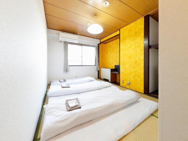 Business Hotel Taiyo : photo 9 de la chambre chambre lits jumeaux de style japonais avec toilettes privatives