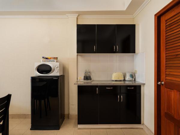 The Classroom Hotel : photo 2 de la chambre appartement lit king-size avec grand balcon