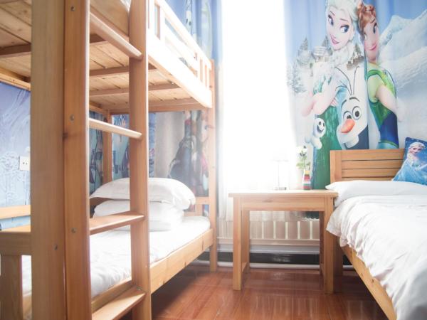 大连天天青旅民宿 : photo 2 de la chambre chambre familiale deluxe