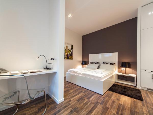 Priuli Luxury Rooms : photo 7 de la chambre chambre double confort avec canapé - bâtiment principal - 1 rue sinjska