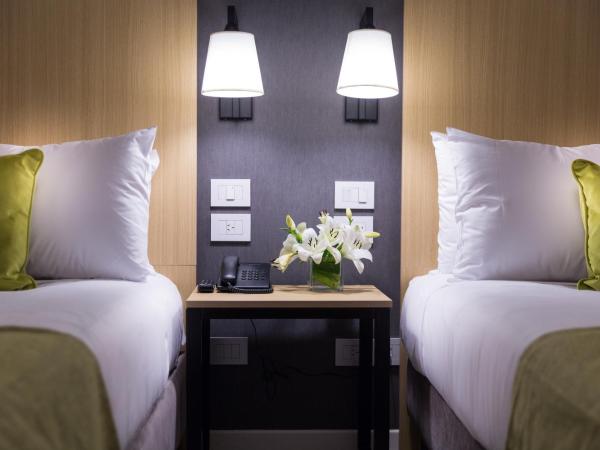 Howard Johnson Plaza Buenos Aires : photo 1 de la chambre chambre 2 lits queen-size - non-fumeurs